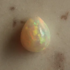 24.31 ct Pear x Ethiopian Welo Opal